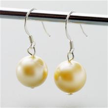 Bild Bryssel örhängen guldfärgade