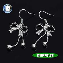 Bild Örhänge silver - Rosetter