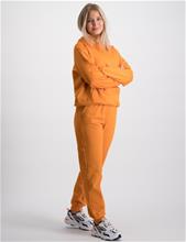 Bild D-XEL, SWEAT PANTS, Orange, Byxor till Tjej, 176 cm