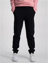 Bild Peak Performance, Jr Original Pants, Svart, Byxor till Tjej, 140 cm