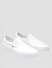 Bild Vans, UA Classic Slip-On, Vit, Skor till Unisex, 40